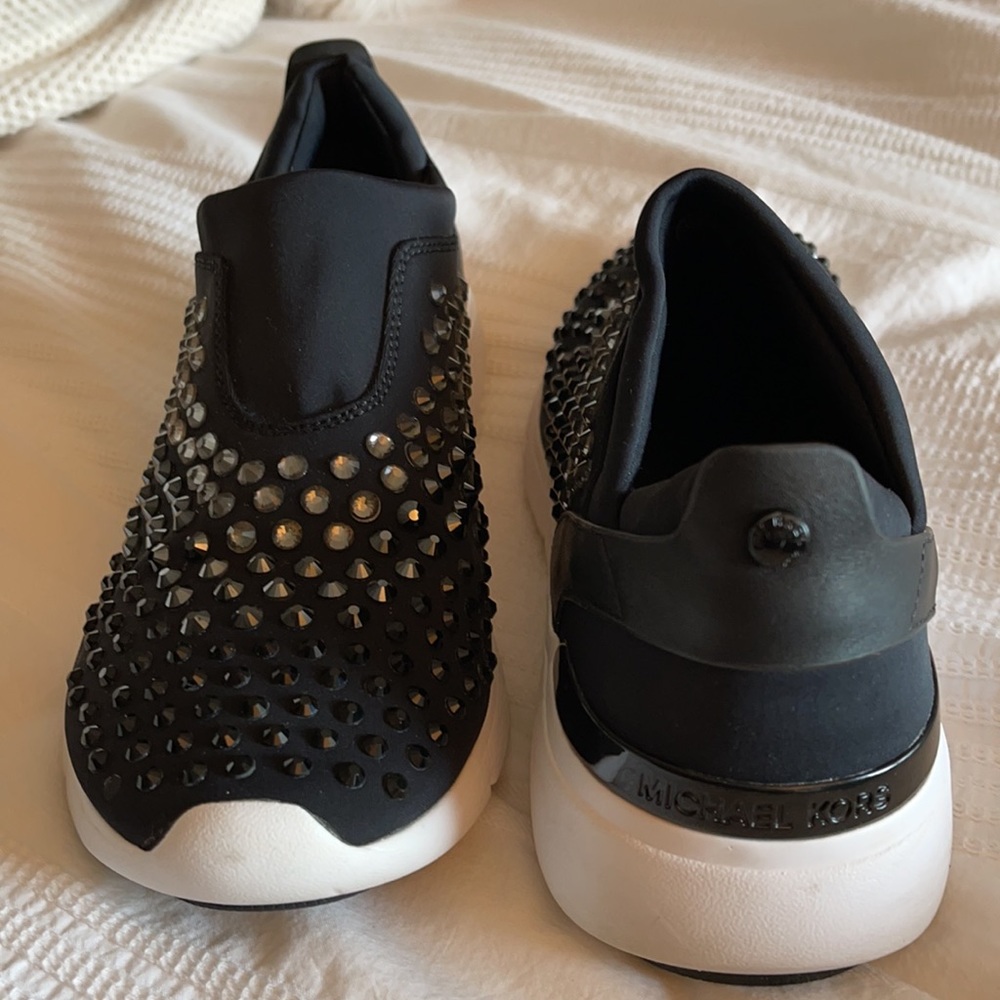 michael kors // black studded slip on tennis shoes